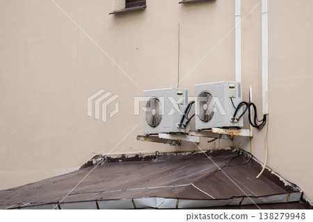 air conditioning on facade of building, air cooling in hot weather.  138279948