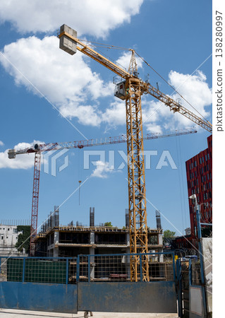 Construction Site With Cranes and Blue Sky During Daytime in an Urban Area Construction Site With Cranes and Blue Sky During Daytime in an Urban Area 138280997