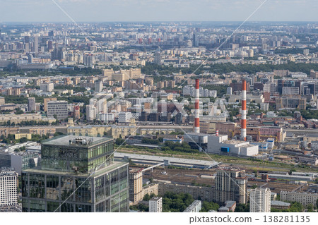 View of the Sprawling Urban Landscape of Moscow Featuring Industrial Structures and Modern Architecture on a Clear Day 138281135