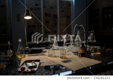 Laboratory Setup With Glassware and Equipment for Scientific Experimentation at Night in a Modern Space Laboratory Setup With Glassware and Equipment for Scientific Experimentation at Night in a Modern Space 138281221
