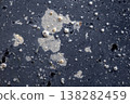 Corroded rough surface texture with mineral deposits and biological growth 138282459