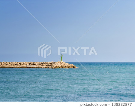 Silent Ocean With Lone Beacon Reaching Into Vast Peaceful Skies Silent Ocean With Lone Beacon Reaching Into Vast Peaceful Skies 138282877