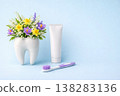 Dental clinic oral care toothbrush toothpaste tooth spring branding reception decor on blue background for clinic ad use 138283136