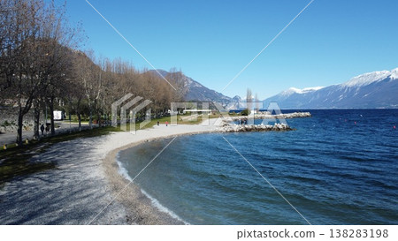 Sunny day on the beach in Toscolano Maderno, Lake Garda, Italy Sunny day on the beach in Toscolano Maderno, Lake Garda, Italy 138283198