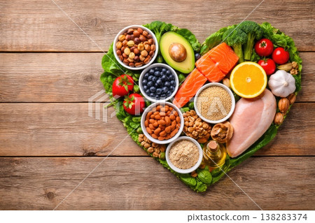 Healthy balanced diet concept with fresh food arranged in heart shape Healthy balanced diet concept with fresh food arranged in heart shape 138283374