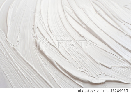 Close-up shot of the texture of spread white acrylic paint (27) Close-up shot of the texture of spread white acrylic paint (27) 138284085