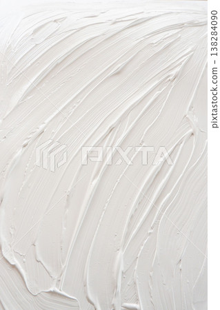 Close-up shot of the texture of spread white acrylic paint (32) 138284090