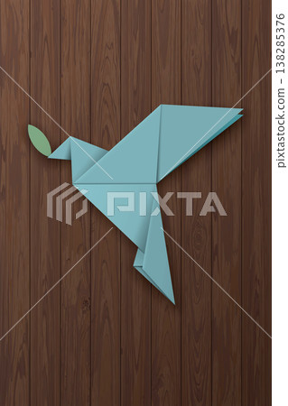 3D light blue origami peace dove with olive leaf on wooden vertical background 3D light blue origami peace dove with olive leaf on wooden vertical background 138285376