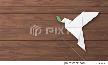 3D white origami peace dove with olive leaf on wooden background have blank space. 3D white origami peace dove with olive leaf on wooden background have blank space. 138285377