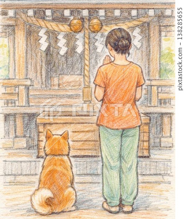 A woman and her dog praying at the shrine's main hall during a walk (back view). 138285655