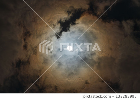 A hazy moon shines in the winter night sky 03 A hazy moon shines in the winter night sky 03 138285995