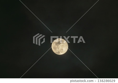The full moon of February shines brightly in the night sky. The full moon of February shines brightly in the night sky. 138286029