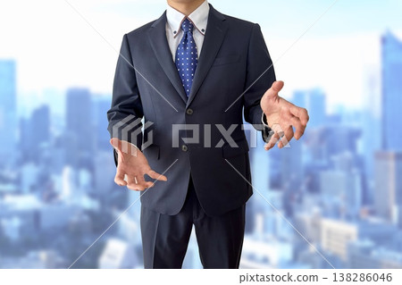 A businessman explaining while turning a potter's wheel. A businessman explaining while turning a potter's wheel. 138286046