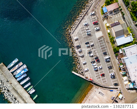 Drone footage of the port town of Nakagi Port, where the Hirizo Beach ferry departs and arrives. Hirizo Beach, Nakagi, Minamiizu Town, Shizuoka Prefecture, Izu Peninsula - 2025 138287711