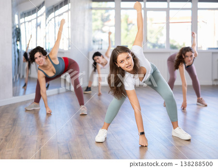 Group of women dancing hip hop in studio Group of women dancing hip hop in studio 138288500