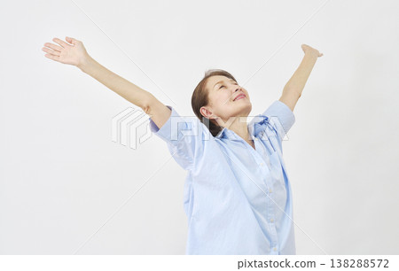 An elderly woman with a white back takes a deep breath. An elderly woman with a white back takes a deep breath. 138288572