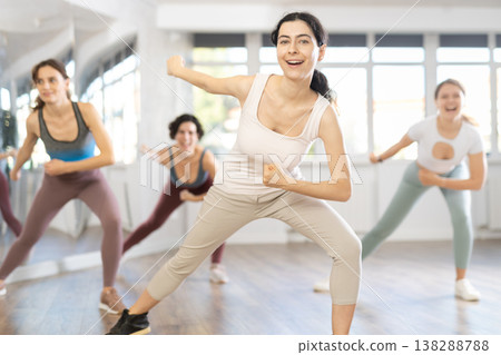 Funk jazz dancers practicing dance moves in studio 138288788