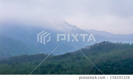 Misty mountain ridges surrounding Ha Yeung Shan Misty mountain ridges surrounding Ha Yeung Shan 138291326