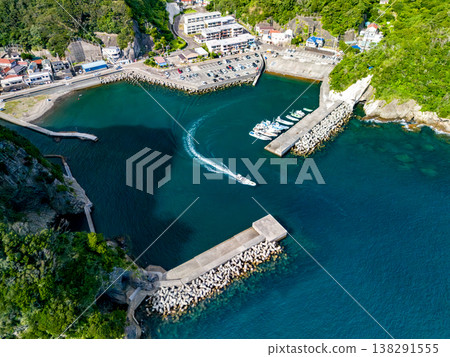 Drone footage of the port town of Nakagi Port, where the Hirizo Beach ferry departs and arrives. Hirizo Beach, Nakagi, Minamiizu Town, Shizuoka Prefecture, Izu Peninsula - 2025 Drone footage of the port town of Nakagi Port, where the Hirizo Beach ferry departs and arrives. Hirizo Beach, Nakagi, Minamiizu Town, Shizuoka Prefecture, Izu Peninsula - 2025 138291555