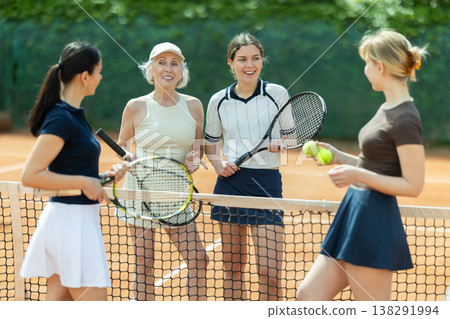 Tennis match female participants chat after game Tennis match female participants chat after game 138291994