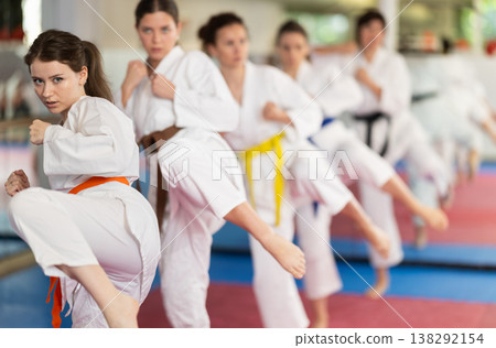 Group of womens practicing martial arts in gym. Active lifestyle and self defense concept 138292154