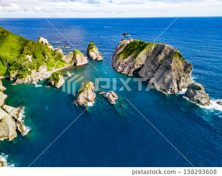 Drone footage of Hirizo Beach in Minami-Izu. Includes Daikonjima Island, Aiai Cape, Yuusuge Park, ferry, swimmers, and more. The southernmost point of the Izu Peninsula. Drone footage of Hirizo Beach in Minami-Izu. Includes Daikonjima Island, Aiai Cape, Yuusuge Park, ferry, swimmers, and more. The southernmost point of the Izu Peninsula. 138293608