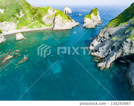 Drone footage of Hirizo Beach in Minami-Izu. Includes Daikonjima Island, Aiai Cape, Yuusuge Park, ferry, swimmers, and more. The southernmost point of the Izu Peninsula. Drone footage of Hirizo Beach in Minami-Izu. Includes Daikonjima Island, Aiai Cape, Yuusuge Park, ferry, swimmers, and more. The southernmost point of the Izu Peninsula. 138293667