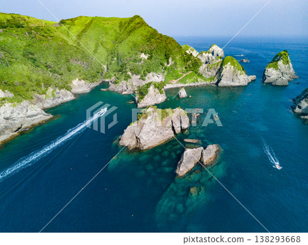 Drone footage of Hirizo Beach in Minami-Izu. Includes Daikonjima Island, Aiai Cape, Yuusuge Park, ferry, swimmers, and more. The southernmost point of the Izu Peninsula. Drone footage of Hirizo Beach in Minami-Izu. Includes Daikonjima Island, Aiai Cape, Yuusuge Park, ferry, swimmers, and more. The southernmost point of the Izu Peninsula. 138293668