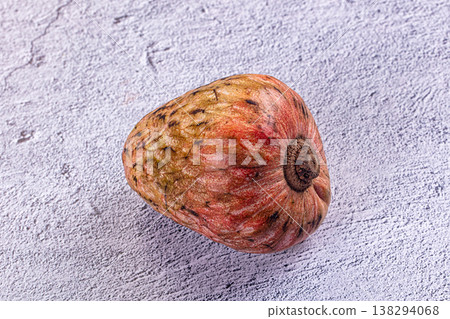 Exotic cherimoya fruit on a wooden table background Exotic cherimoya fruit on a wooden table background 138294068
