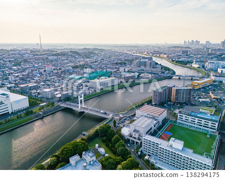 Drone footage of the Tsurumi River at dusk. To the west lies Tsurumi Ward in Yokohama City, and to the east are Kawasaki Ward and Saiwai Ward in Kawasaki City. This is a survey conducted before river construction work. Drone footage of the Tsurumi River at dusk. To the west lies Tsurumi Ward in Yokohama City, and to the east are Kawasaki Ward and Saiwai Ward in Kawasaki City. This is a survey conducted before river construction work. 138294175