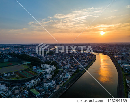 Drone footage of the Tsurumi River at dusk. To the west lies Tsurumi Ward in Yokohama City, and to the east are Kawasaki Ward and Saiwai Ward in Kawasaki City. This is a survey conducted before river construction work. Drone footage of the Tsurumi River at dusk. To the west lies Tsurumi Ward in Yokohama City, and to the east are Kawasaki Ward and Saiwai Ward in Kawasaki City. This is a survey conducted before river construction work. 138294189