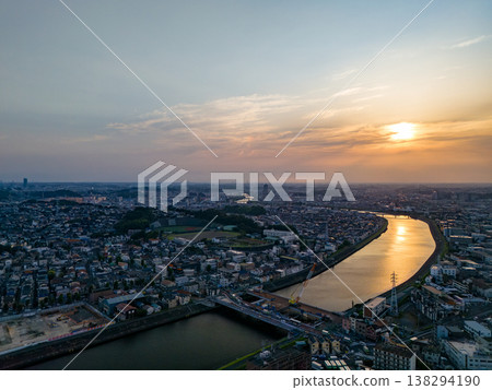 Drone footage of the Tsurumi River at dusk. To the west lies Tsurumi Ward in Yokohama City, and to the east are Kawasaki Ward and Saiwai Ward in Kawasaki City. This is a survey conducted before river construction work. Drone footage of the Tsurumi River at dusk. To the west lies Tsurumi Ward in Yokohama City, and to the east are Kawasaki Ward and Saiwai Ward in Kawasaki City. This is a survey conducted before river construction work. 138294190
