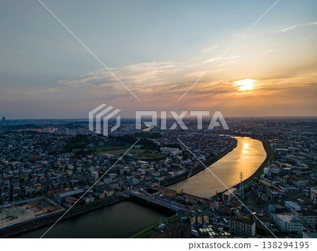 Drone footage of the Tsurumi River at dusk. To the west lies Tsurumi Ward in Yokohama City, and to the east are Kawasaki Ward and Saiwai Ward in Kawasaki City. This is a survey conducted before river construction work. Drone footage of the Tsurumi River at dusk. To the west lies Tsurumi Ward in Yokohama City, and to the east are Kawasaki Ward and Saiwai Ward in Kawasaki City. This is a survey conducted before river construction work. 138294195