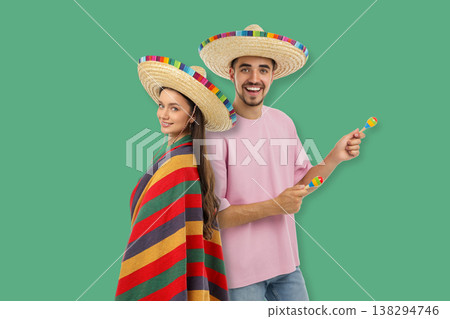 Friends enjoy Cinco de Mayo with music and hats Friends enjoy Cinco de Mayo with music and hats 138294746