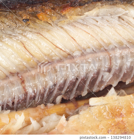 Grilled catfish carcass on a white background 138294810
