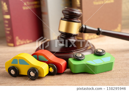 Car accident lawsuit and insurance, Judge hammer with car model. 138295946