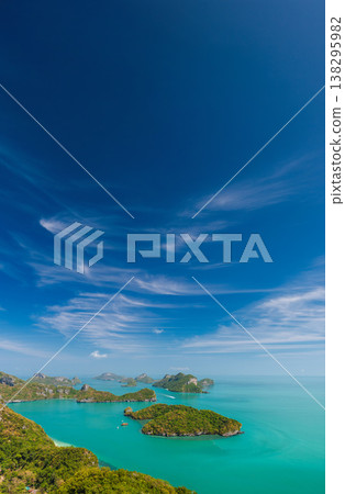 Panoramic aerial view of Mu Ko Ang Thong Marine Park islands in Thailand with turquoise sea, tropical limestone islands and dramatic blue sky, scenic landscape near Ao Nang 138295982