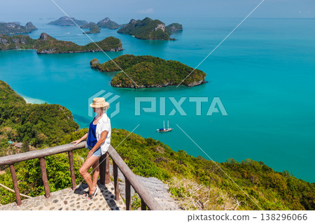 Middle-aged woman enjoying sea view at Ang Thong Marine National Park viewpoint in Thailand 138296066