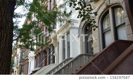 New York City townhouse buildings, residential brownstone row houses in Manhattan or Brooklyn, USA. 138297087