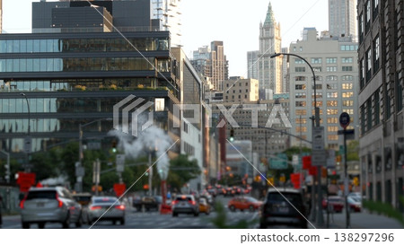 New York City, USA. Manhattan Downtown Varick street. Woolworth building, road traffic and hot steam New York City, USA. Manhattan Downtown Varick street. Woolworth building, road traffic and hot steam 138297296