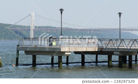 George Washington bridge, Hudson river in New York City, USA. Riverside park pier in West Harlem. 138297320