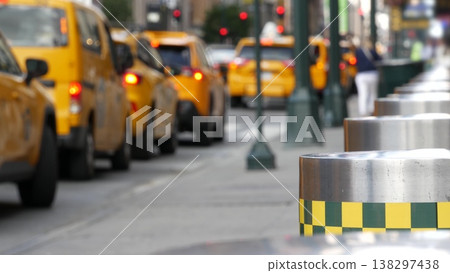 Manhattan Midtown street New York City, USA. Yellow taxi cars on 8 avenue. Penn Station road traffic 138297438
