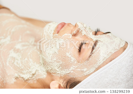 Young Asian Female Relaxing With Facial Mask At Spa For Skin Care And Rejuvenation 138299239