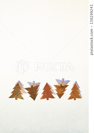 Gold Christmas Tree Cutouts Arranged On White Background For Holiday Decoration Ideas Gold Christmas Tree Cutouts Arranged On White Background For Holiday Decoration Ideas 138299241