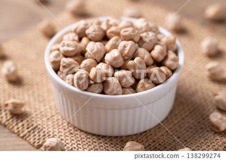 Organic raw chickpeas in a white bowl, healthy food ingredient 138299274