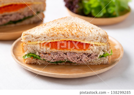 Healthy toasted whole wheat sandwich with tuna, Ebiko (Capelin roe), cheese, and fresh lettuce Healthy toasted whole wheat sandwich with tuna, Ebiko (Capelin roe), cheese, and fresh lettuce 138299285