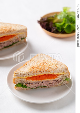 Healthy toasted whole wheat sandwich with tuna, Ebiko (Capelin roe), cheese, and fresh lettuce 138299289