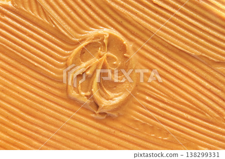 Smooth Swirl Of Creamy Peanut Butter With Textured Ripples In Golden Color Palette Smooth Swirl Of Creamy Peanut Butter With Textured Ripples In Golden Color Palette 138299331