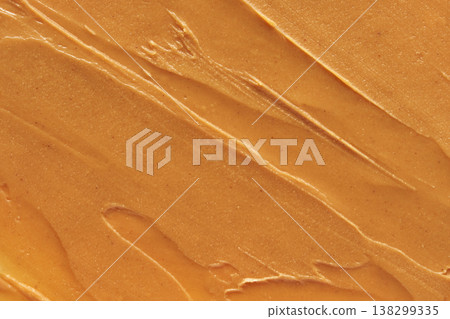 Smooth Creamy Peanut Butter Texture With Swirls In Rich Golden Brown Shade Close-Up Smooth Creamy Peanut Butter Texture With Swirls In Rich Golden Brown Shade Close-Up 138299335
