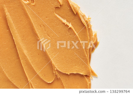 Smooth Creamy Peanut Butter Spread On White Surface Closeup Texture 138299764
